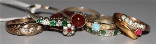A 14ct gold ring and seven other assorted rings.